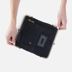 Lauren Clutch-Wallet In Pebbled Leather - Black With Studs 11 Lauren Clutch-Wallet In Pebbled Leather - Black With Studs -Hobo Sales Store NV 22647BLK 03 54f7575a 5597 4e3b 92e9 aec61a0cd620