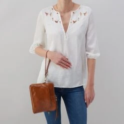 Reeva Crossbody In Polished Leather - Truffle 12 Reeva Crossbody In Polished Leather - Truffle -Hobo Sales Store VI 35857TRUF 06 e458dd31 817d 4466 bbbb 1521724b6959